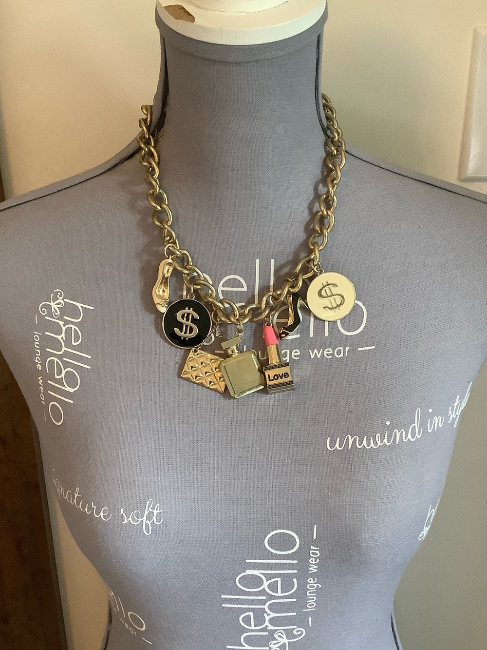 Gold Charm Statement Necklace with Black and Pink Accents
